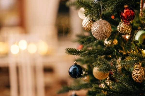 Close up shot of a lit up Christmas tree