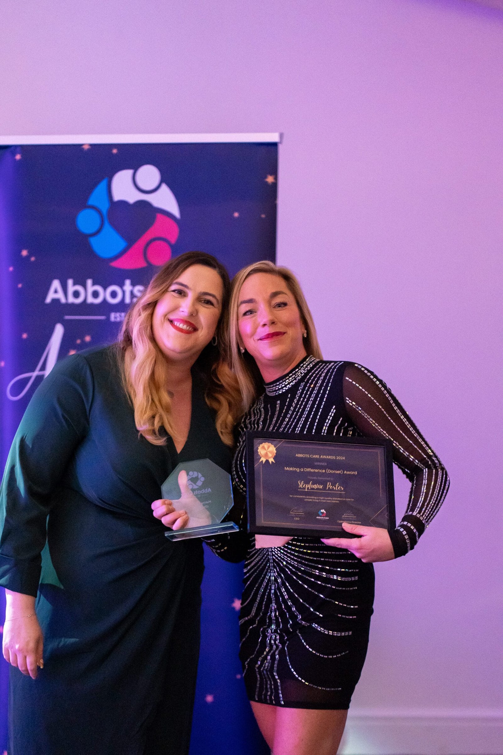 Steph Porter, Care Worker from Dorset poses with new branch manager Jazz at the Abbots Care Awards 2024